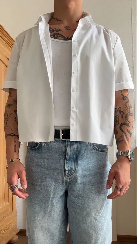 White men's cropped short sleeve polyester shirt on hanger showing regular fit and plain design