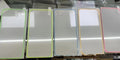 Fluorescent tempered glass screen film for iPhone showing luminous green glow effect