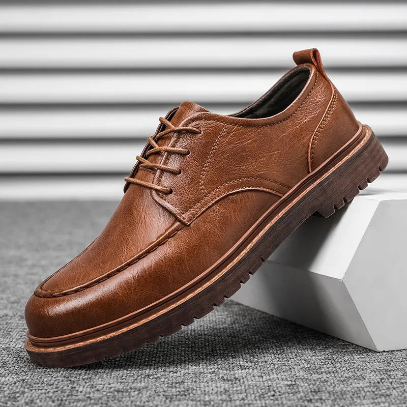 Men's black and brown leather casual shoes with round toe and flat rubber soles