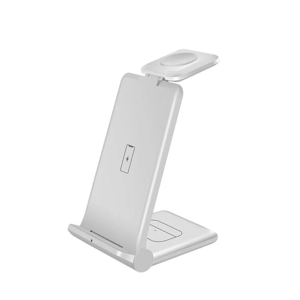 White 3-in-1 wireless charging station showing phone, Apple Watch and AirPods charging simultaneously on a desk.