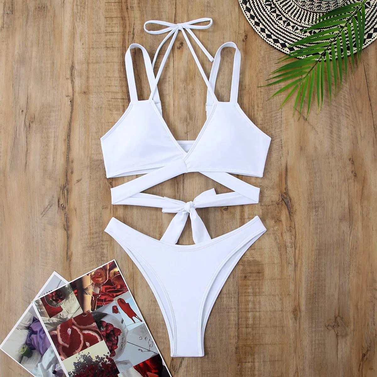 Women's solid colour strap bikini swimsuit on a white background.