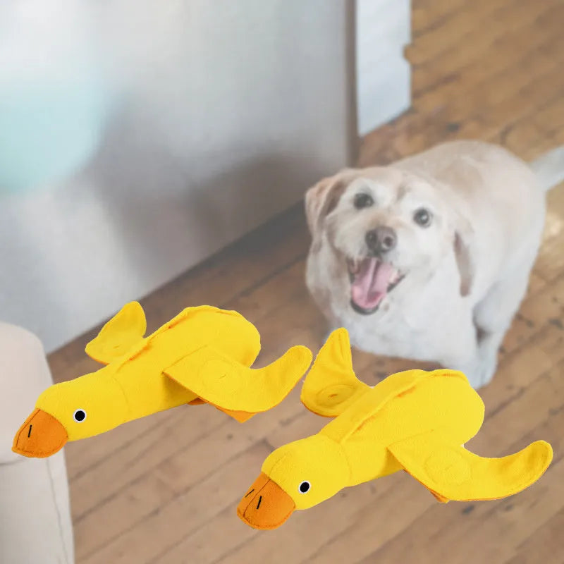 Yellow teddy dog toy with duck sound feature and treat dispensing openings for training