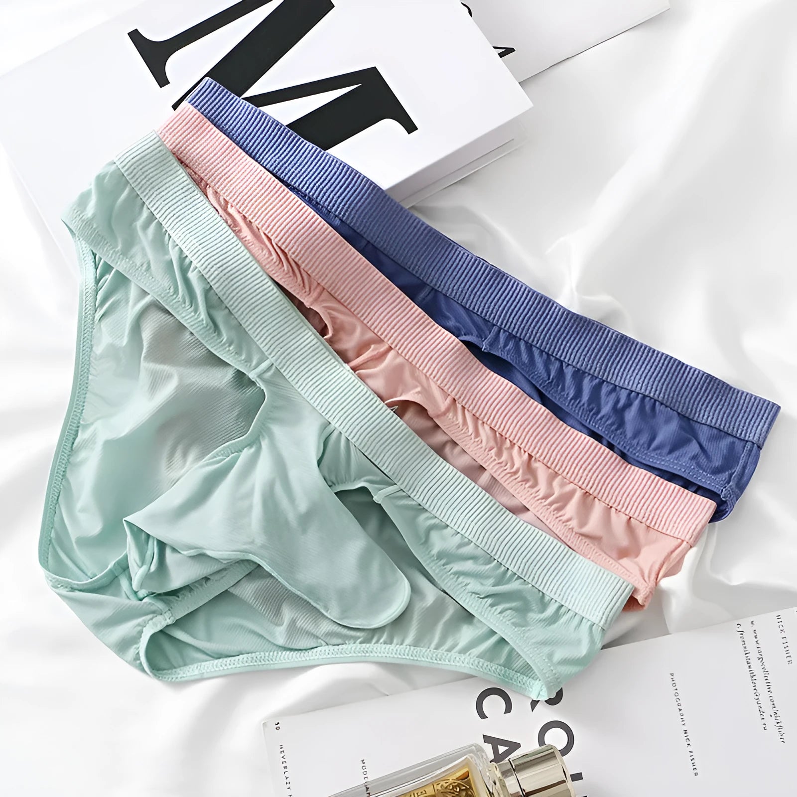 Men's ice silk low waist briefs in black, grey, light green, pink, and purplish blue colours