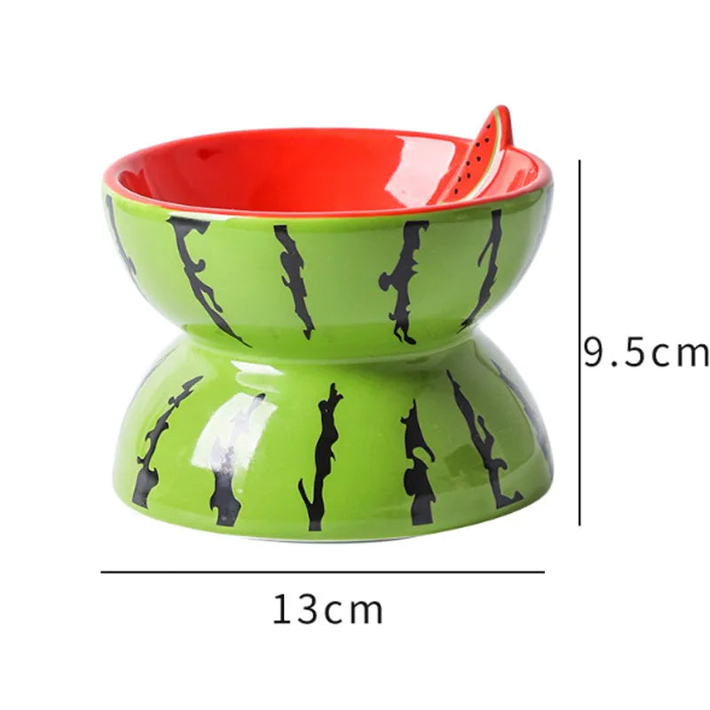 Ceramic elevated cat bowl in orange colour with tilted wide dish design.