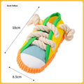 Plastic dog chew toy with sound squeaker in bendable slipper design for dental care