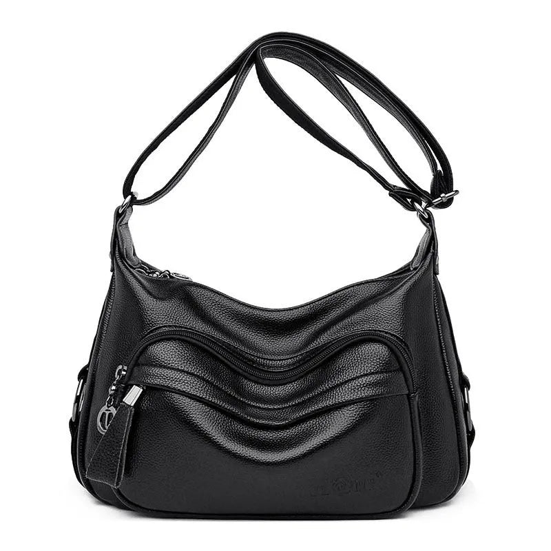 Large black women's shoulder bag with multiple internal organisation pockets and crossbody strap