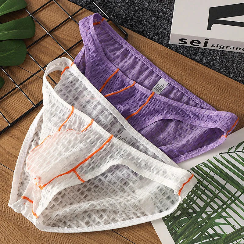 Men's low waist ice silk lace briefs in solid colours on a white background.