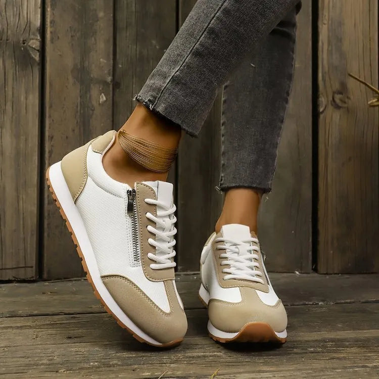 Women's flat-heeled shoes in artificial PU upper with rubber sole, shown in grey colour