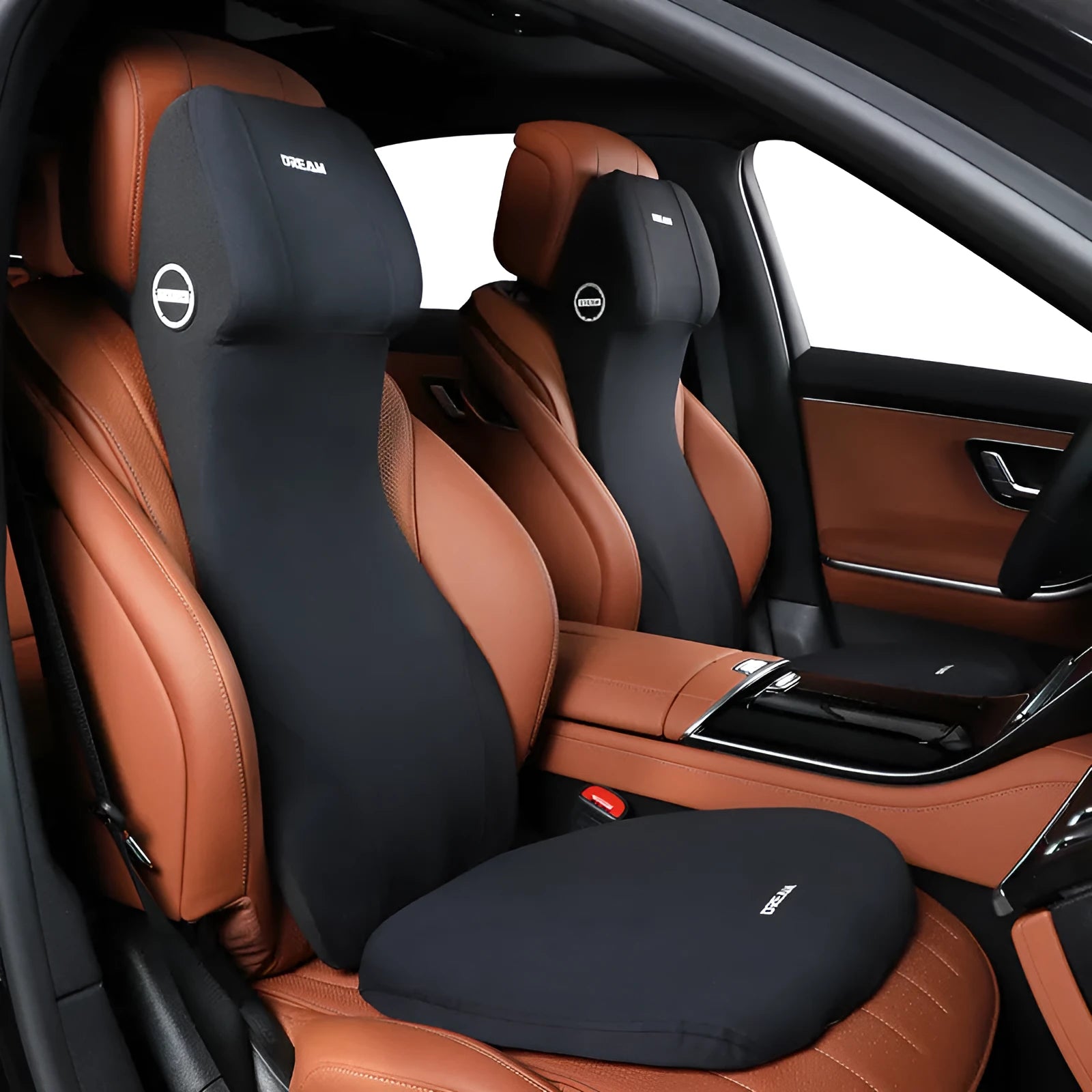 Black automotive memory foam cushion and lumbar support pillow set on a car seat.