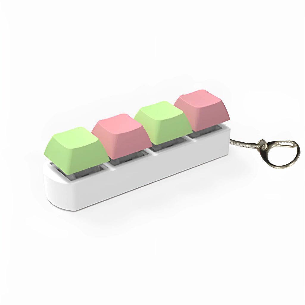A compact mechanical keyboard switch tester with four different coloured keycaps and an included keycap puller.