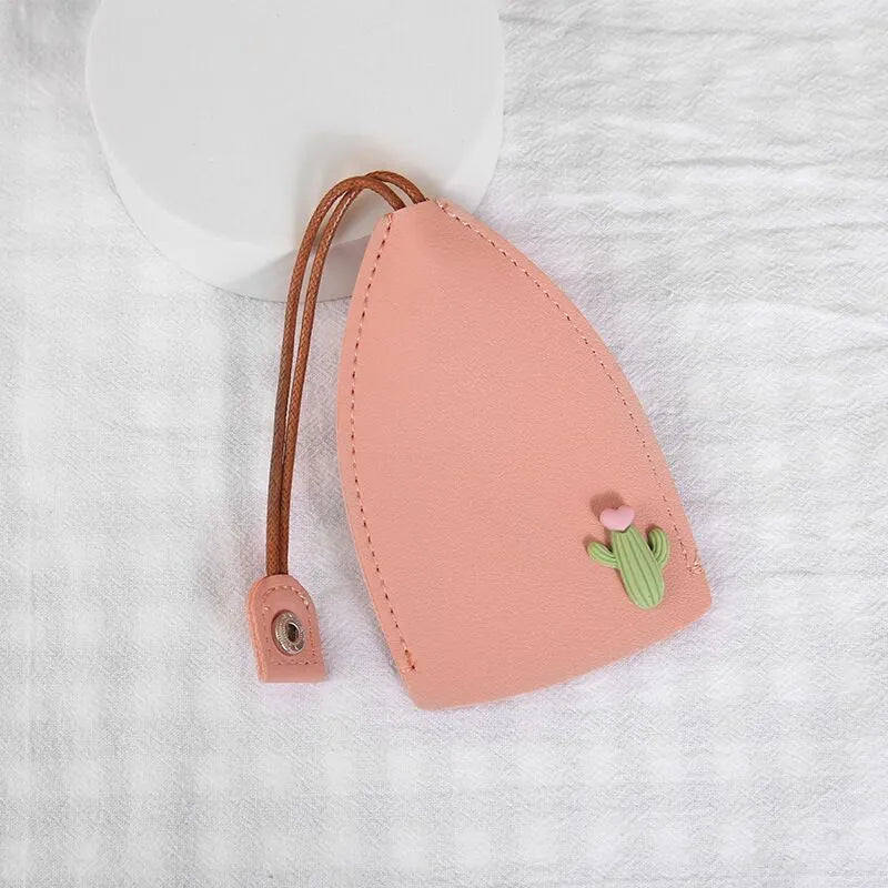 Colourful cartoon pull-out key case made from PU leather showing design options