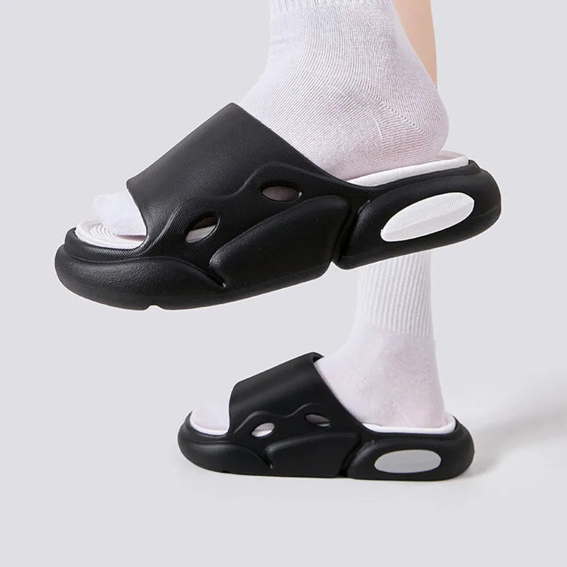 Pair of two-colour EVA slippers with a thick sole and leather lining, shown in available colour options.