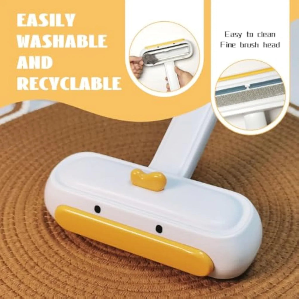 White portable pet hair remover brush with yellow duck design showing 4cm diameter