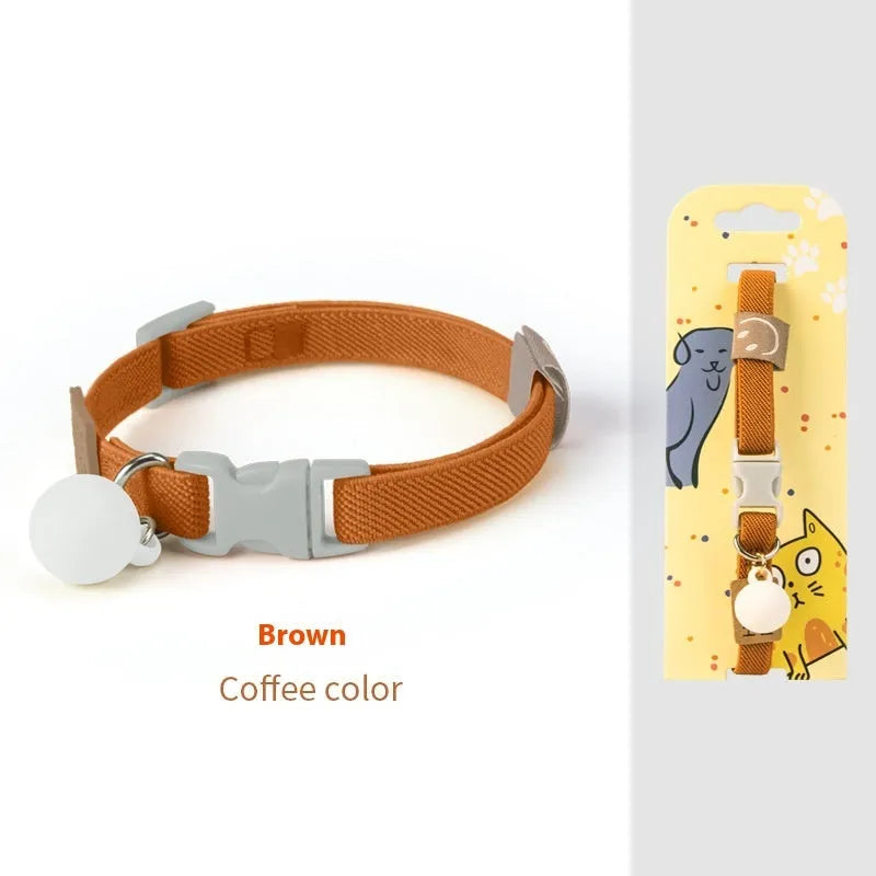 A small dog's polyester elastic pet collar in a solid colour with a monochrome pattern.