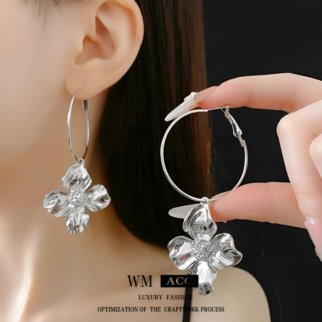 Geometric flower earrings in silver or gold finish with vintage styling