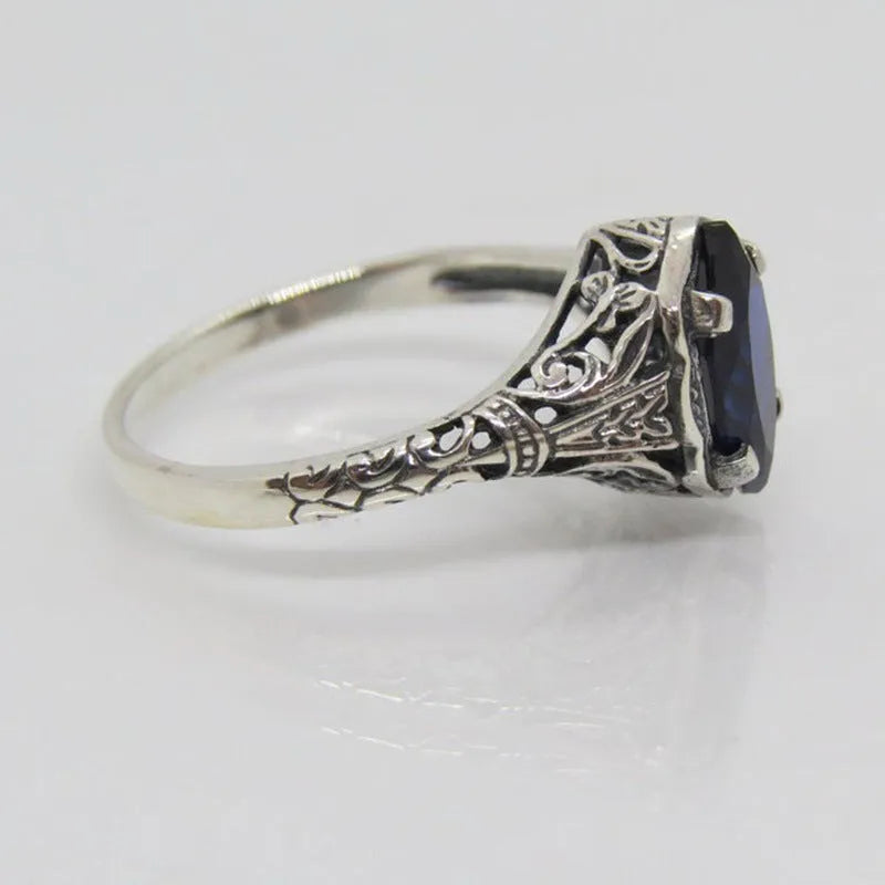 Silver geometric hollow women's ring in electroplated alloy showing openwork pattern
