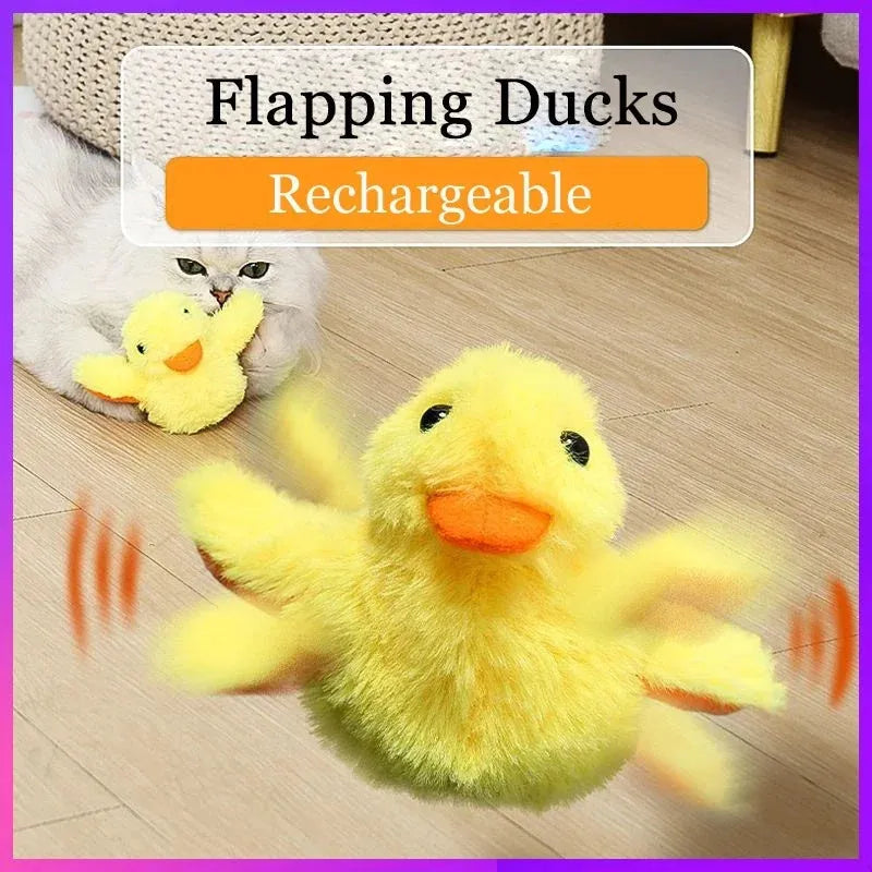 Yellow flapping duck plush cat toy with vibration sensor on a grey background.