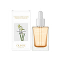 30ml glass bottle of brightening and firming facial treatment oil.