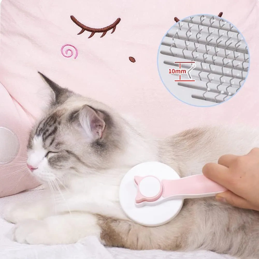Blue self-cleaning cat grooming brush with rubber handle and round-tip needles.