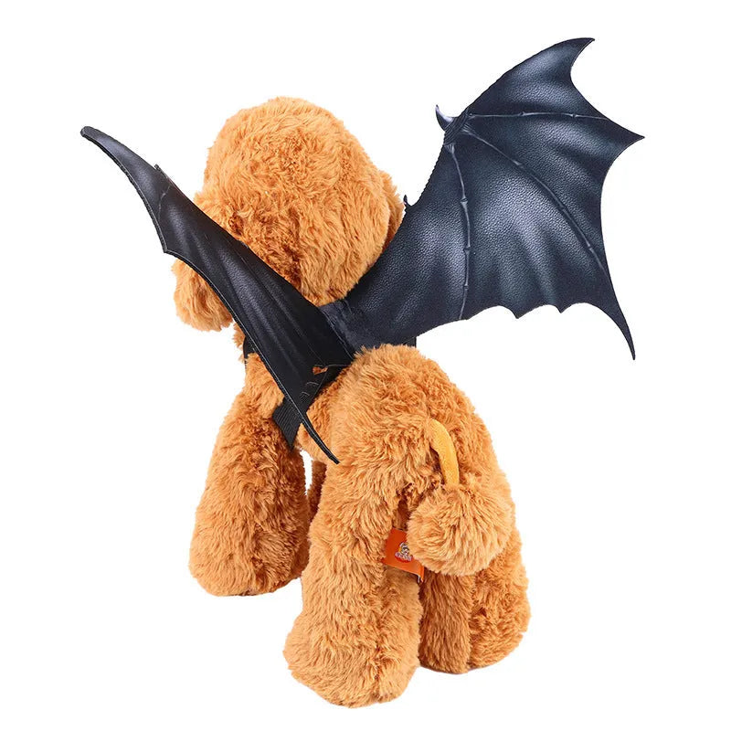 Black cloth bat wing costume for pets, shown in small, medium, and large sizes for cats and dogs.