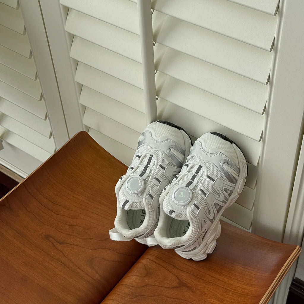 Girls' lightweight casual shoes in breathable PU leather mesh, shown in solid black, beige, or pink.