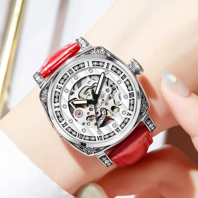 Leather strap mechanical watch with luminous hands showing black dial option