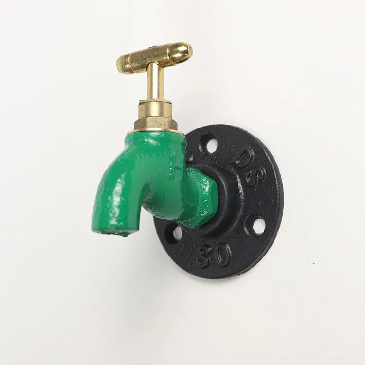 Water pipe style metal towel rack hook in black, green, or red on a white wall