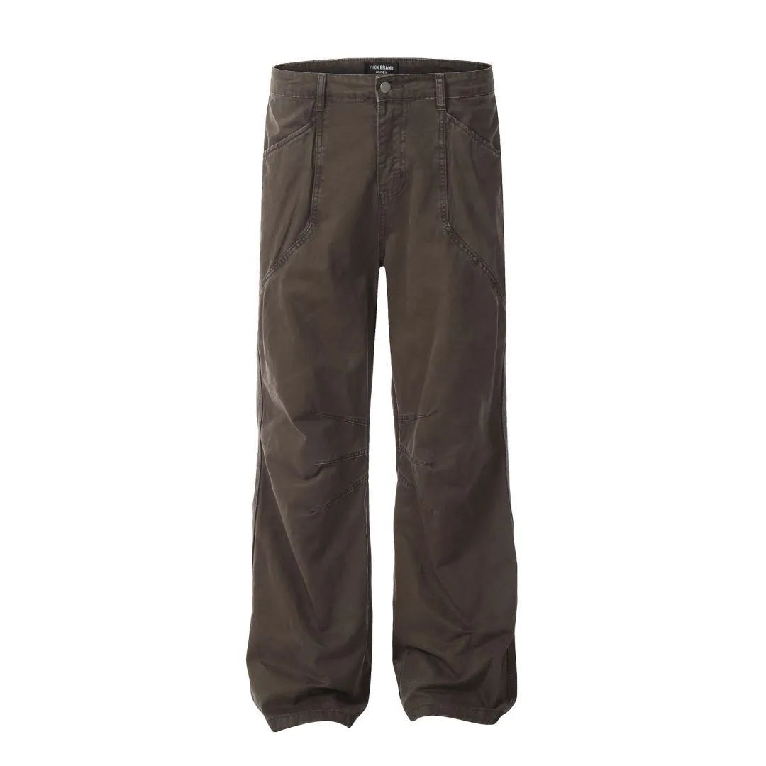 Men's brown loose fit straight leg cotton jeans with a high waist and zip fly on a hanger.