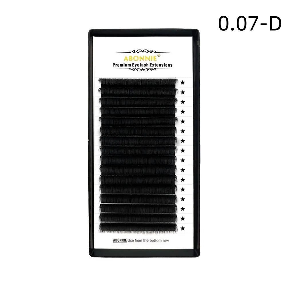Pack of false eyelashes showing dense 16-row mink hair lashes on a clear band.