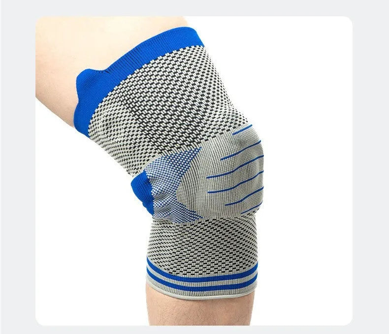 Silicone massage spring bar knee protector in cotton, shown in black and blue colour on a leg.