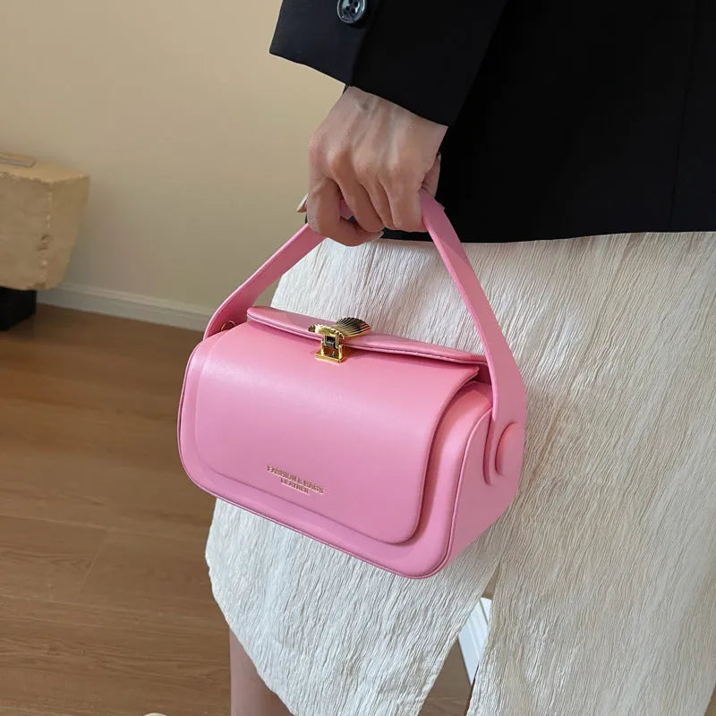 Women's personalised PU leather messenger bag with letter monogram, shown in beige colour with visible stitching.