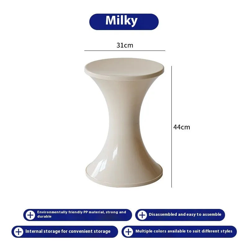 A plastic hourglass-shaped shoe changing stool in a choice of colours.