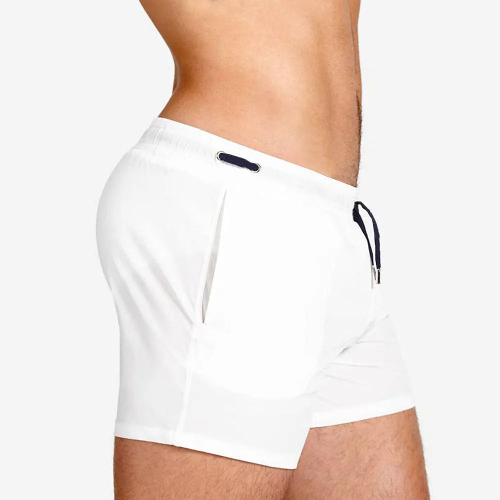 Polyester sports shorts with mesh lining in Army Green colour on size chart