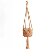 Hand-woven minimalist flower pot in polyester cotton showing net pocket extension cord design