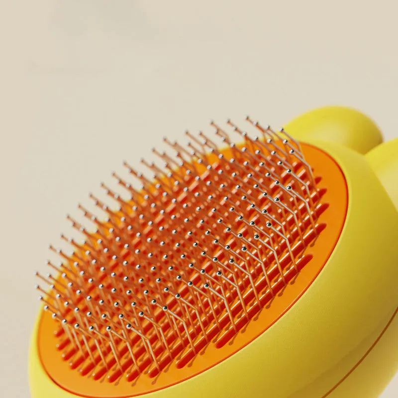 Self-cleaning pet grooming brush with release button and metal comb teeth in multiple colour options