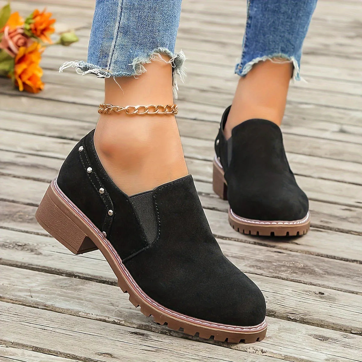 Women's light brown suede ankle boots with elastic band and thick low heel on rubber sole