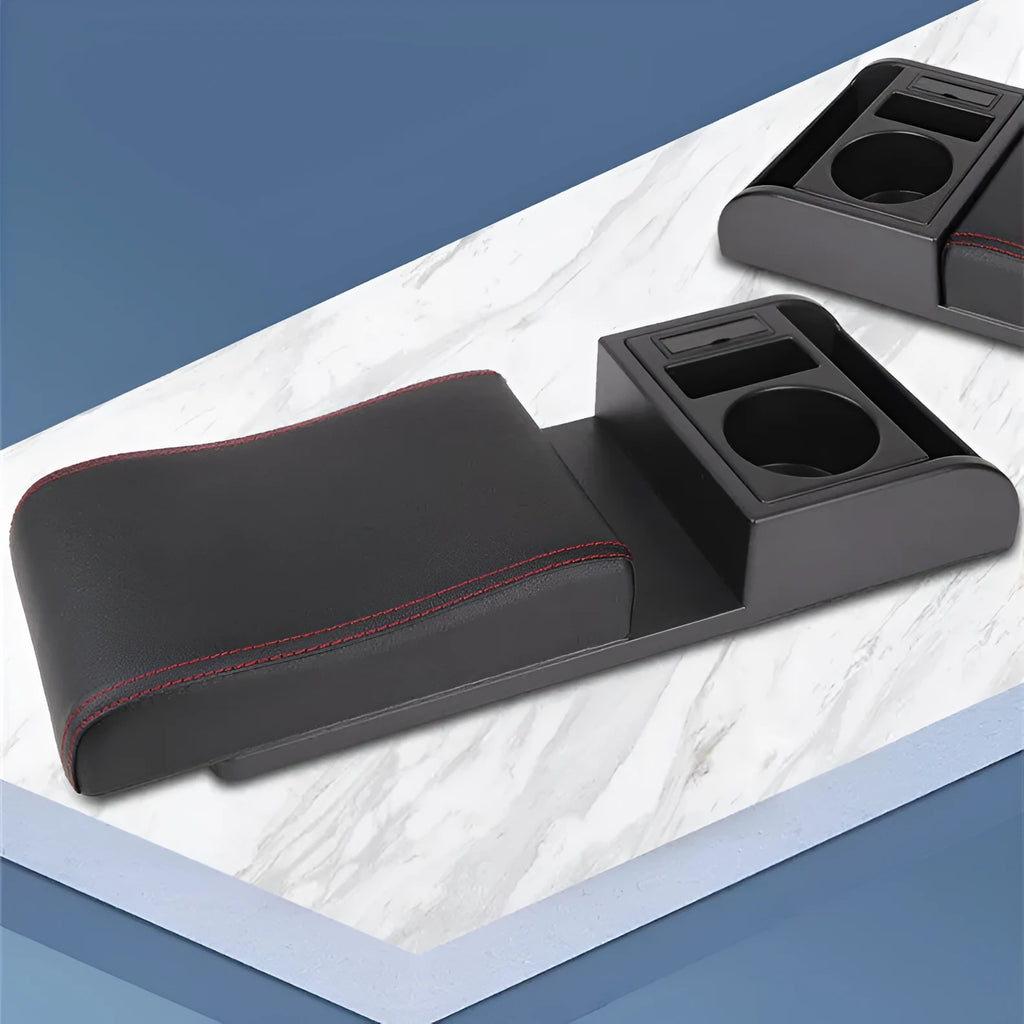 Universal plastic car armrest cover shown in black with red cord pattern on a car centre console.