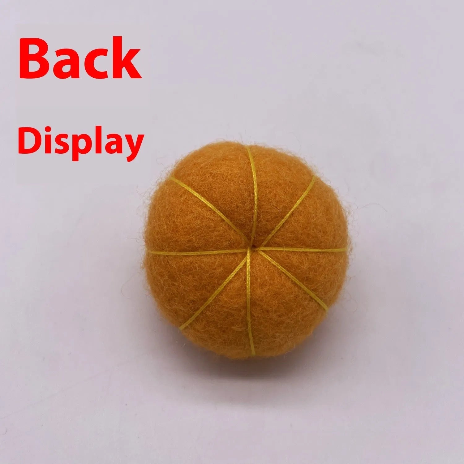 Wool felt pumpkin ornament measuring 5cm diameter in autumn colours for miniature displays