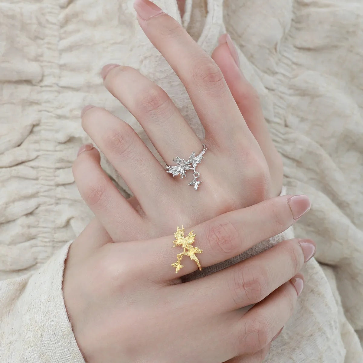 Silver adjustable butterfly ring with electroplated finish in white gold or 18K gold colour.