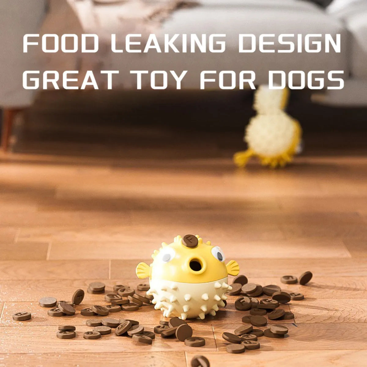 Yellow fish-shaped vinyl dog chew toy with textured surface and squeaker