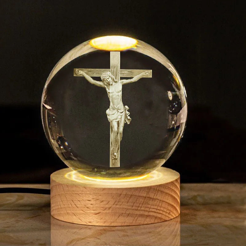 6cm white crystal ball with internal cross design on illuminated solid wood base