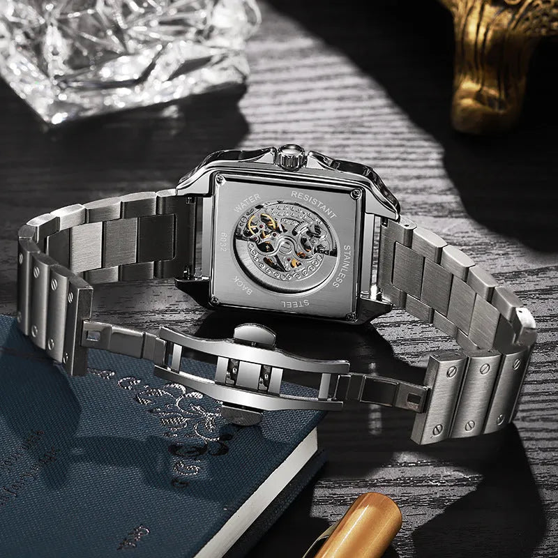 Men's square automatic watch with diamond-studded bezel on a steel bracelet