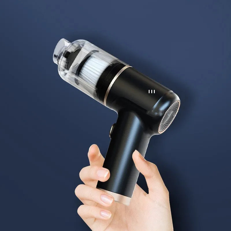 Black wireless car vacuum cleaner and inflator with multiple nozzle attachments