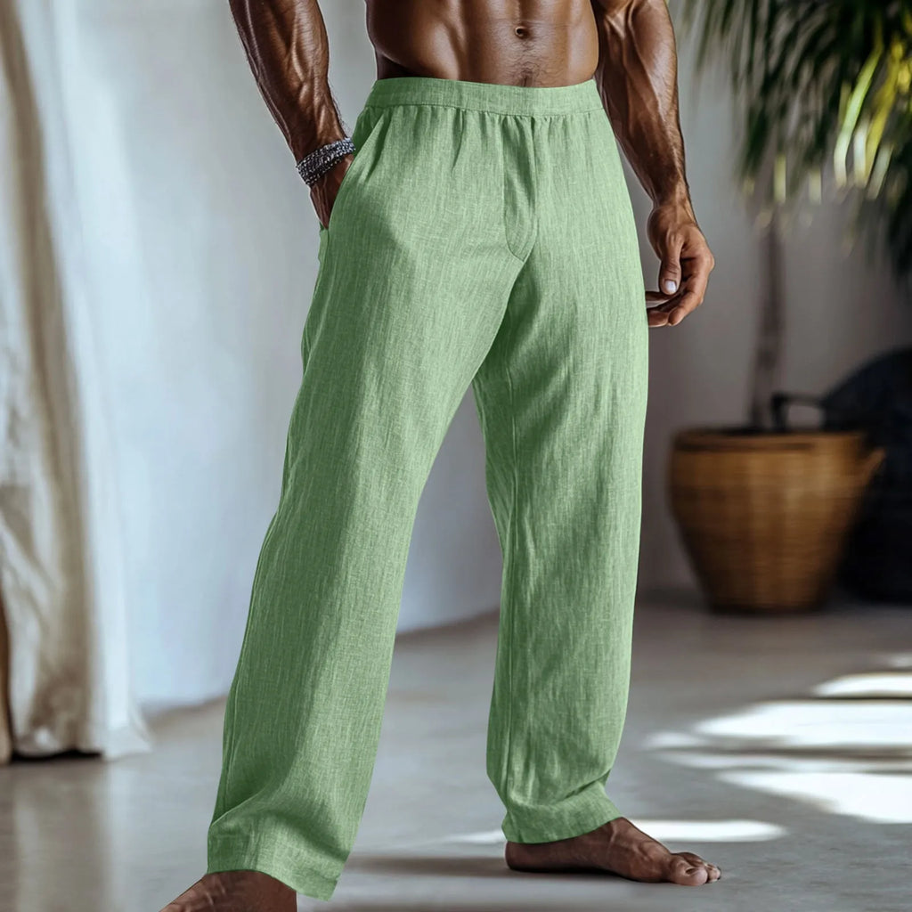 Straight leg cotton linen casual trousers with pockets shown in a solid colour.