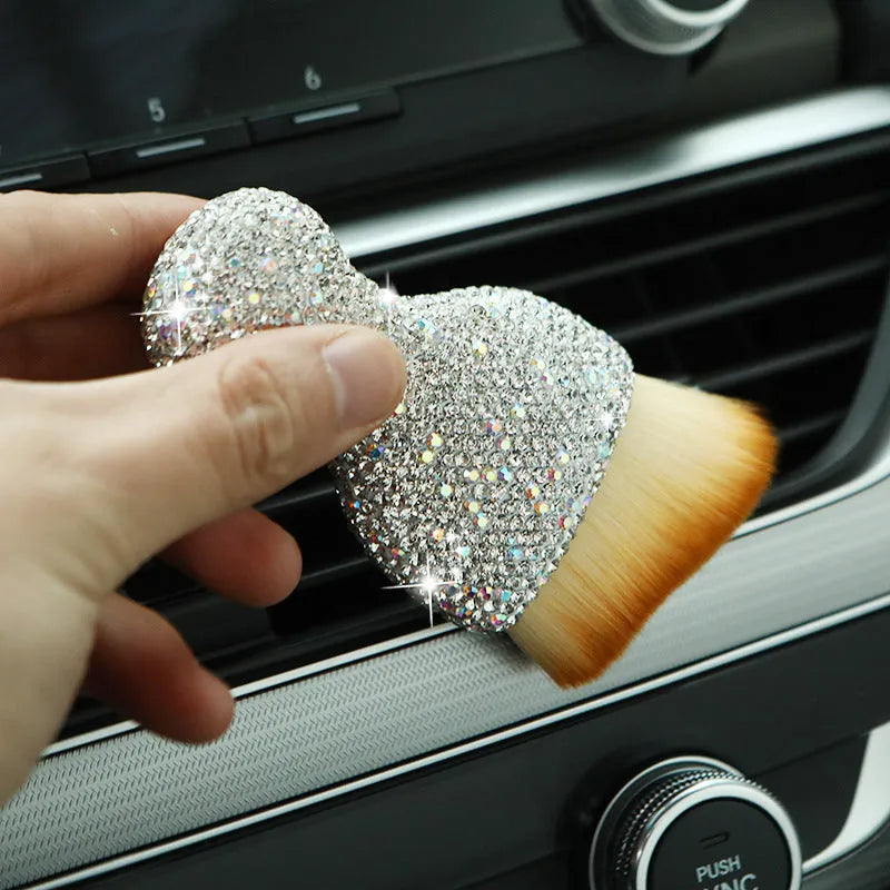 PVC soft brush for car interior dust removal, 10 cm long, in white, pink, or black colour.