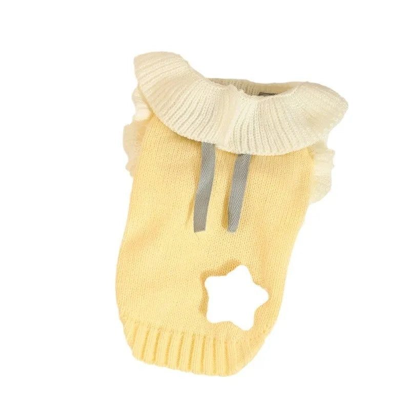 Yellow acrylic knit dog sweater jumper on a small dog, showing casual pullover style.