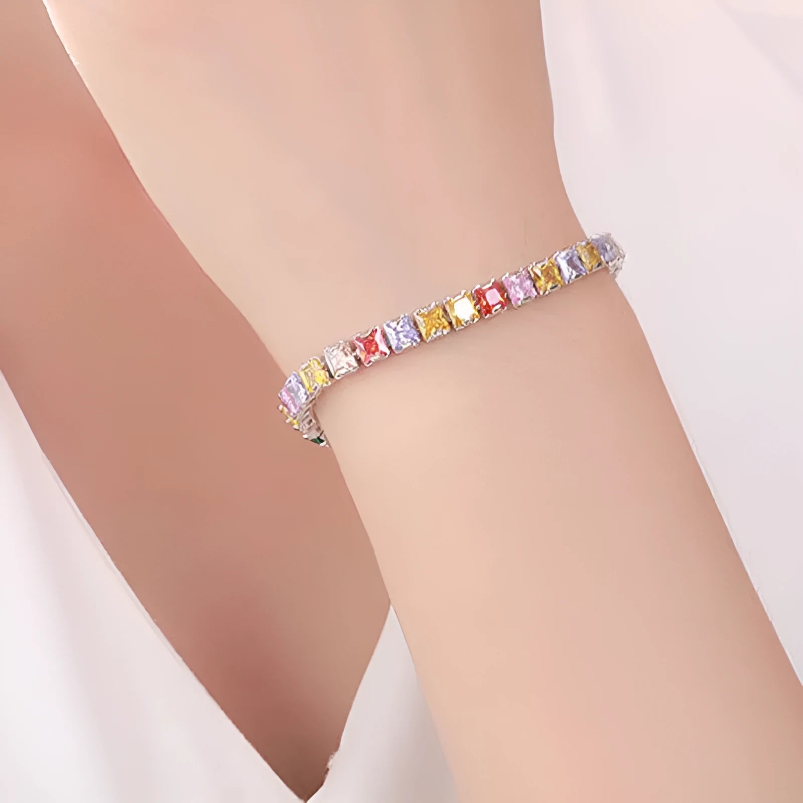 Electroplated real platinum square diamond bracelet with geometric design and gang drill elements in zircon
