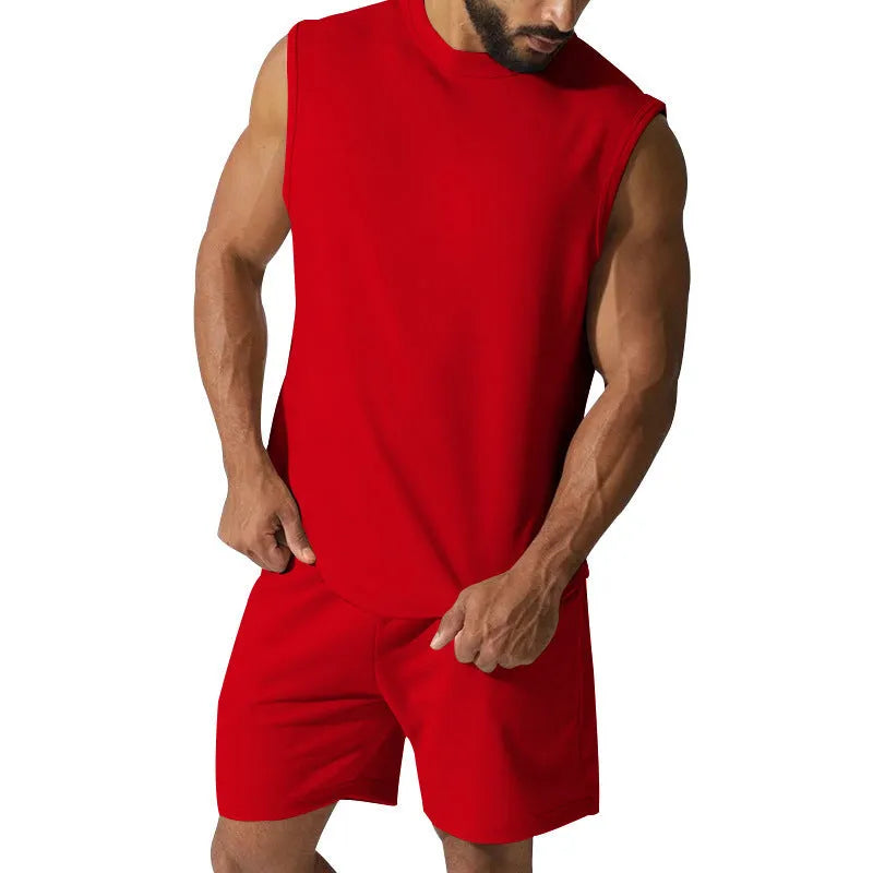Men's sleeveless sports suit consisting of thin cotton blend top and matching shorts in solid colour