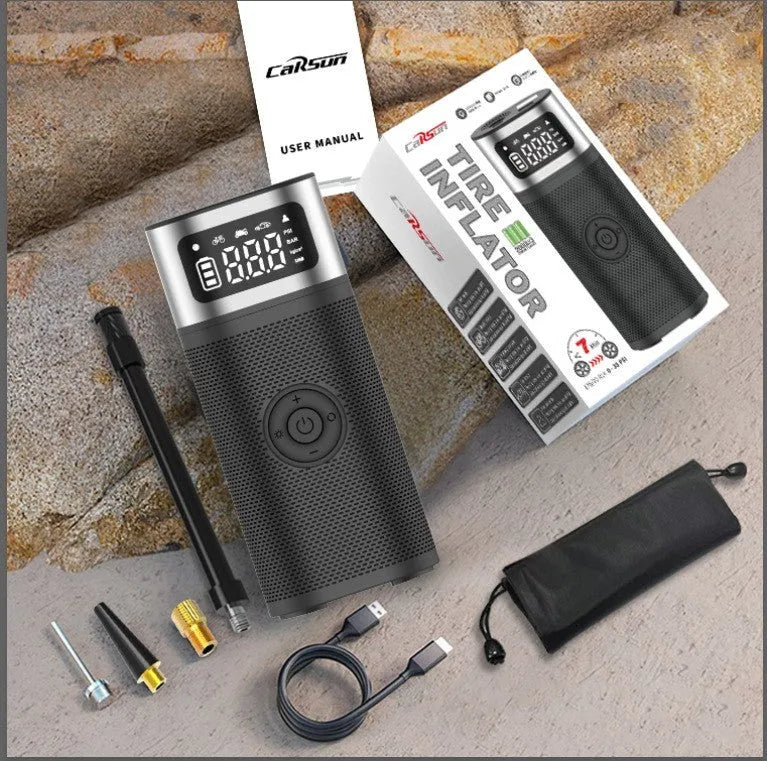 Black portable wireless vehicle air pump with USB-C cable and multiple inflation nozzles in storage bag