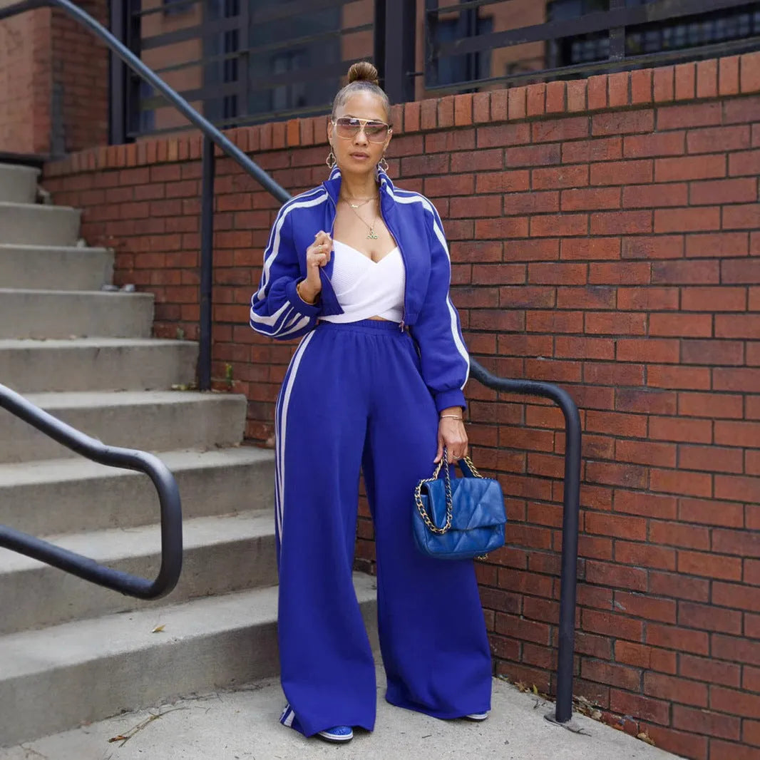 Grey striped sweater with zipper and matching trousers, a street hipster two-piece set.